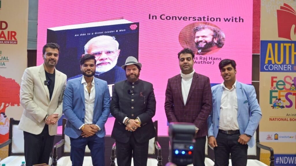 World Book Fair Unveils 'Modi: The Man, The Vision, The Transformation' by Hans Raj Hans, Published by Invincible Publishers - National - PNN Digital World Book Fair Unveils 'Modi: The Man, The Vision, The Transformation' by Hans Raj Hans, Published by Invincible Publishers - New Delhi (India), February 28: Prime Minister Narendra Modi, a transformative figure in Indian politics, is the subject of a comprehensive new book titled "Modi: The Man, The Vision, The Transformation," authored by the esteemed Hans Raj Hans, who is recognized for his versatility as both a singer and a politician. Renowned for his diverse talents, Hans Raj Hans launched the book on February 15, 2024, at the prestigious World Book Fair 2024. This insightful publication offers readers an intimate look into the life, vision, and transformative leadership of Prime Minister Modi. - PNN Digital